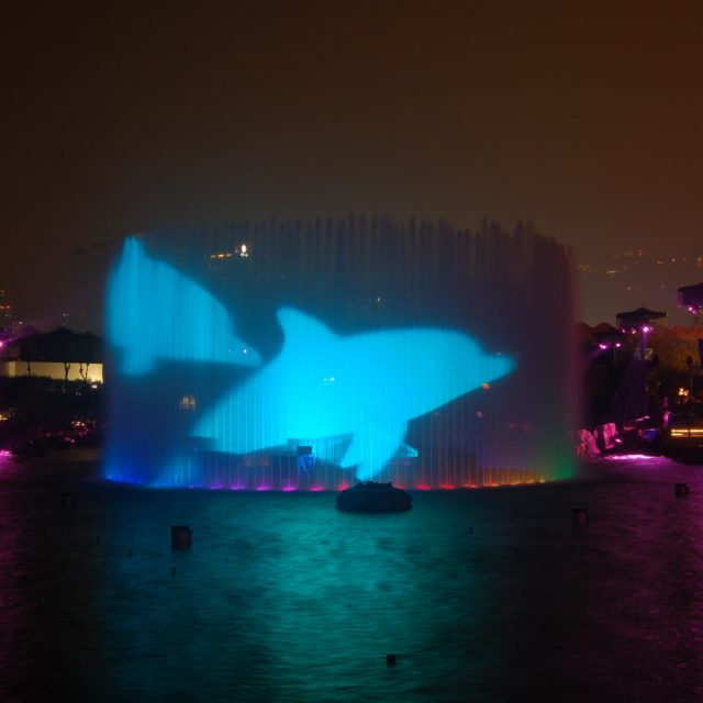 360 jet fountain water screen projection of dolphins by lci for Symbio show at Ocean Park, hong kong